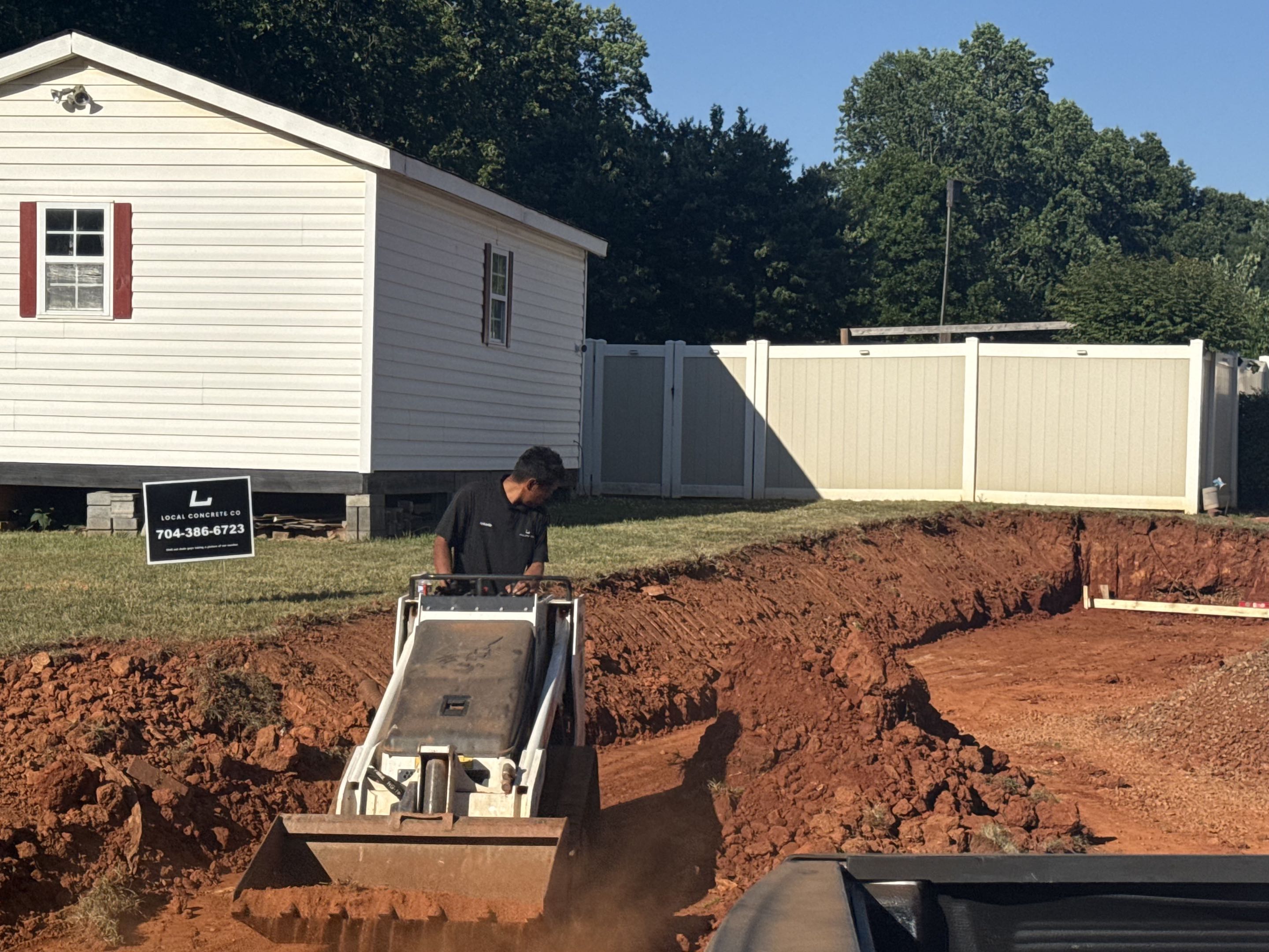 Compacted Base and Laser-Set Forms — step 06 of a Local Concrete Co project in Charlotte, NC