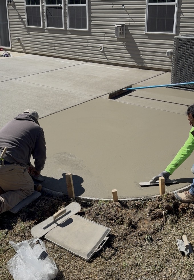 Final Smoothing at the Right Moment — step 13 of a Local Concrete Co project in Charlotte, NC